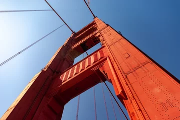 Foto op Plexiglas Golden Gate Bridge Looking up at Golden Gate Bridge support tower