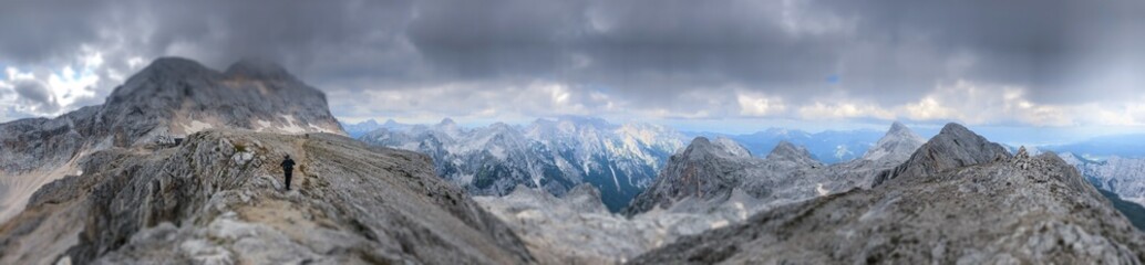 Obraz premium Landscape view from path leading to highest Slovenian mountain Triglav at 2864m. Mountain at left side is Triglav.