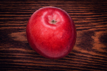 Red Apple on the wood.