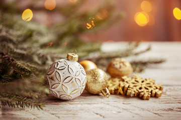Christmas background with golden christmas balls, snowflake and decoration.