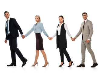 successful business team holding hands and walking ahead isolated on white