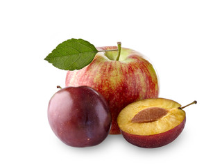 Red apple with leaf  and  plum on white background