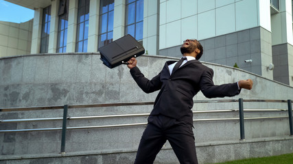 Employee extremely happy with promotion, shouting with happiness, success