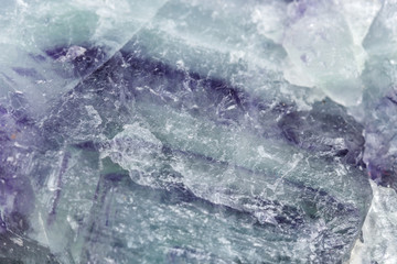 Macro mineral stone Fluorite on white background close up