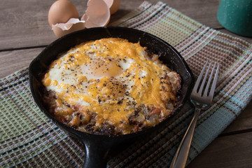Cast iron skillet with hash egg dish
