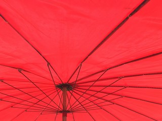 close up red umbrella texture