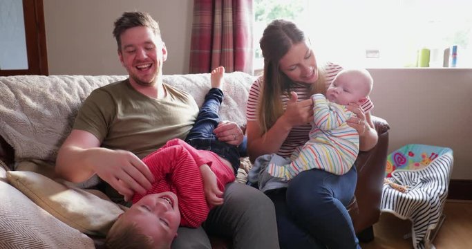 Mother, Father and Sons Spending Quality Time Together