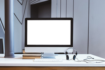 Monitor on table, blank screen, mockup