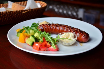 Vegetable salad and sausage