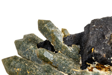 Macro mineral stone Quartz Hedenbergite Prase on ilvite on a white background