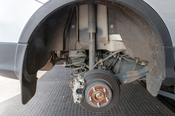 The Inside Of The Wheel Arch Of A Silver Car