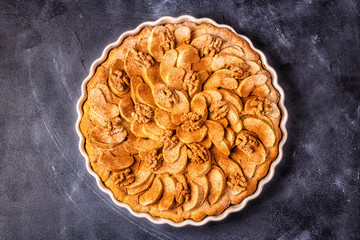 Apple pie with walnuts and cinnamon.