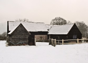 old barns in the snow