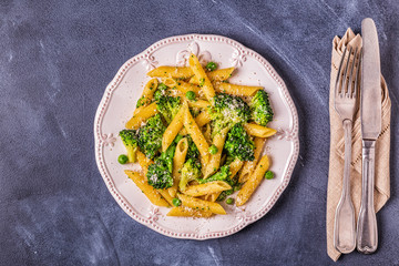 Pasta with broccoli, green peas, garlic, cheese.