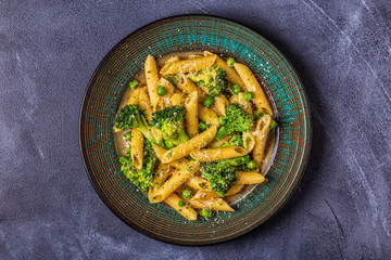 Pasta with broccoli, green peas, garlic, cheese.