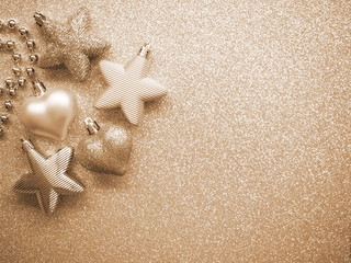 Fototapeta na wymiar Shining Christmas decoration - golden stars and hearts