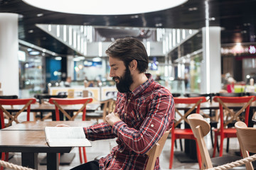 Modern man reads a book