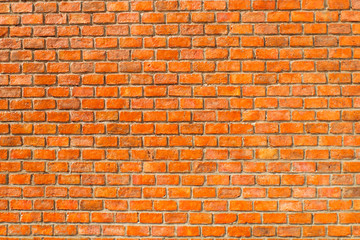 Rectangular orange bricks random pattern wall facade.  orange brick wall seamless pattern texture background 