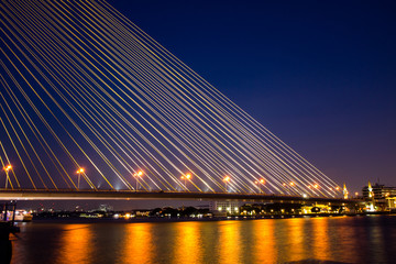 Lighting tensile structure at Rama 8 Bridge Bangkok Thailand, across Chaophraya river