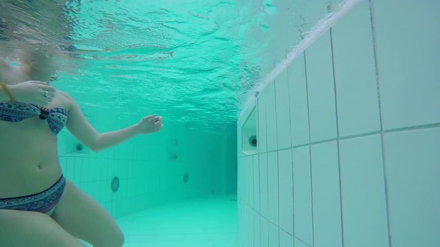 Underwater Swimming In An Artificial Stream