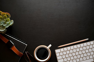 Business accessories on the leather dark  table top and copy space