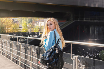 Modern young woman in a big city