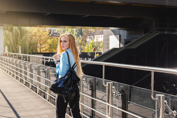 Modern young woman in a big city