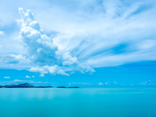 Seascape view under cloudy blue sky