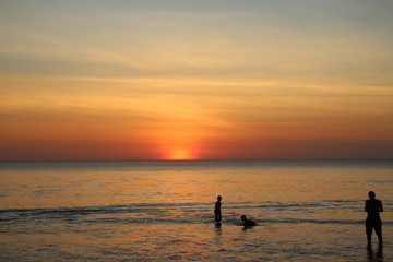 Play in tha sunset water