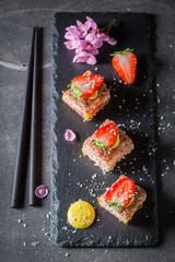 Top view of sweet sushi made of strawberry
