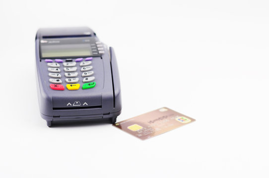 Credit card reader machine and smart  card on white background