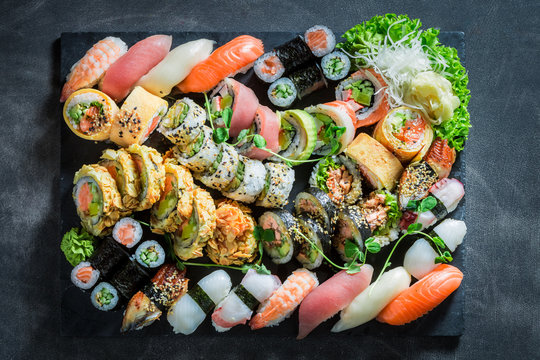 Top view of sushi set made of avocado and salmon