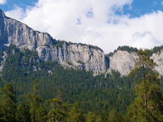 a big rock wall in the swiss mountains