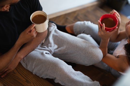 Couple having coffee at home