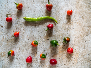 Pile of red chili peppers and spicy pepper. Pile of miscellaneous chili pepper