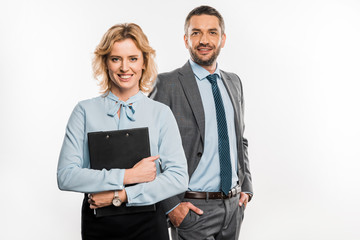 professional business people in formal wear standing together and smiling at camera isolated on white