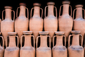 Ancient roman amphorae stored at hold ship as ancient times trade