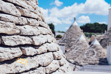 Detail of Alberobello's famous Trulli, the characteristic cone-roofed houses of the Itria Valley, Apulia, Southern Italy.
