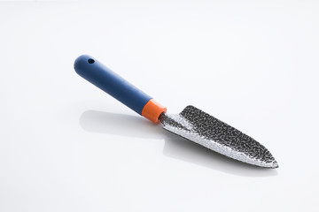 Tools: Close up of a Gardening Trowel Isolated on White Background Shot in Studio.