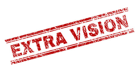 EXTRA VISION seal imprint with corroded texture. Red vector rubber print of EXTRA VISION title with corroded texture. Text tag is placed between double parallel lines.