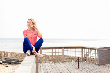 A young girl spends time on the coast