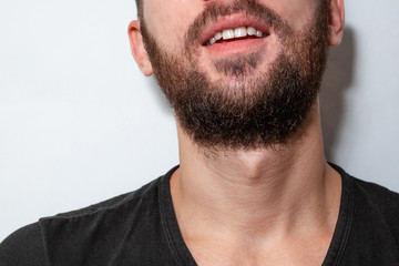 Obraz premium chin of a young guy with a beard