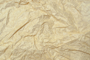 Сrumpled yellow paper texture background
