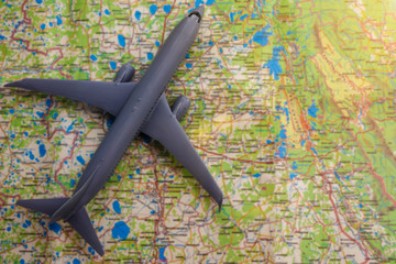 Obraz na płótnie Canvas passenger plane on the map background. air travel.