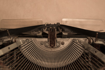 Fototapeta na wymiar vintage typewriter with a clean sheet of paper. writer, journalism.