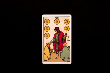 An individual minor arcana tarot card isolated on black background. Six of pentacles.