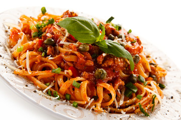 Pasta with bolognese sauce on white background
