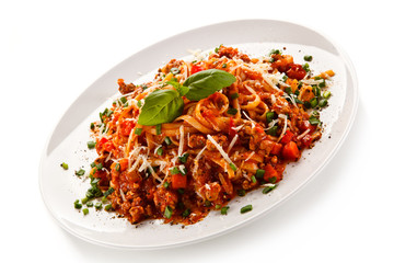 Pasta with bolognese sauce on white background