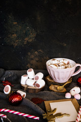 Good New Year spirit. Coffee with marshmallows and cinnamon. Pink mug. Cooking yourself.Home comfort. New Year. Christmas time. Winter mood.Letter to Santa Claus. To Do list.New Year resolution
