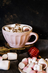 Good New Year spirit. Coffee with marshmallows and cinnamon. Pink mug. Cooking yourself. Photos for coffee. Home comfort. New Year. Christmas time. Winter mood.